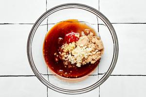 brown sugar, soy sauce, rice vinegar, garlic, ginger, sriracha, and sesame oil in a bowl