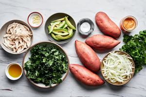 sweet potatoes, olive oil, chicken, kale, onion, garlic, salt, avocado, & cilantro in bowls to make loaded sweet potatoes