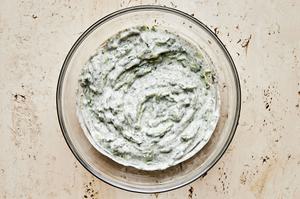 a bowl of tzatziki made with Greek yogurt, cucumber, dill, za'atar, garlic, lemon juice, salt and pepper