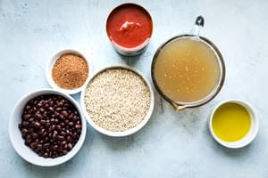 ingredients for Mexican Brown rice olive oil, chicken stock, tomato sauce taco seasoning and black beans