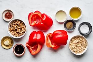 roasted red peppers, walnuts, breadcrumbs, lemon juice, pomegranate molasses, olive oil & spices in prep bowls