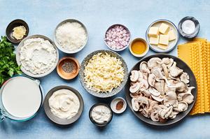 lasagna noodles, olive oil, mushrooms, ricotta, mozzarella, parmesan, butter, shallots, spices, and flour in prep bowls
