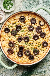 homemade mushroom mac and cheese in a large braiser