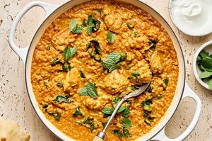 A hearty one-pot meal featuring tender chicken simmered with lentils & aromatic herbs, creating a flavorful & comforting stew