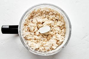 flour, baking powder, baking soda, salt, minced onion, butter and buttermilk pulsed in a food processor