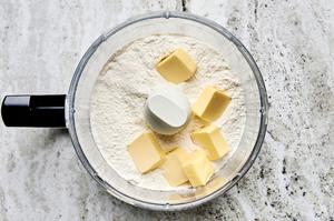 flour, baking soda, salt, sugar and butter in a food processor