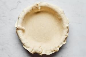 raw pie crust laid in a 9 inch deep dish pie plate