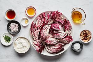 radicchio wedges, olive oil, salt, vinegar, shallot, thyme, dijon, honey, hazelnuts and Creme Fraiche  in prep bowls