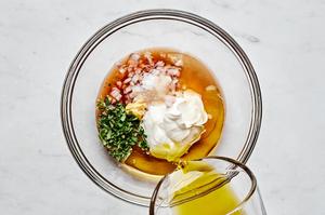 sherry vinegar, minced shallot, fresh thyme, mustard, honey, Creme Fraiche, olive oil,  and salt in a glass bowl