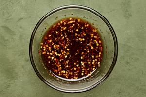 fish sauce, brown sugar, sriracha, red pepper flakes, sesame oil and rice vinegar whisked together in a glass bowl