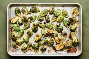 Roasted Brussels Sprouts with Sweet Fish Sauce Dressing on a baking sheet