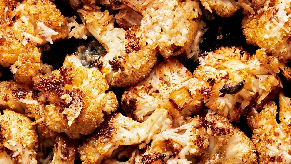 roasted cauliflower seasoned with olive oil, salt, garlic powder, smoked paprika, red pepper flakes, and grated Parmesan