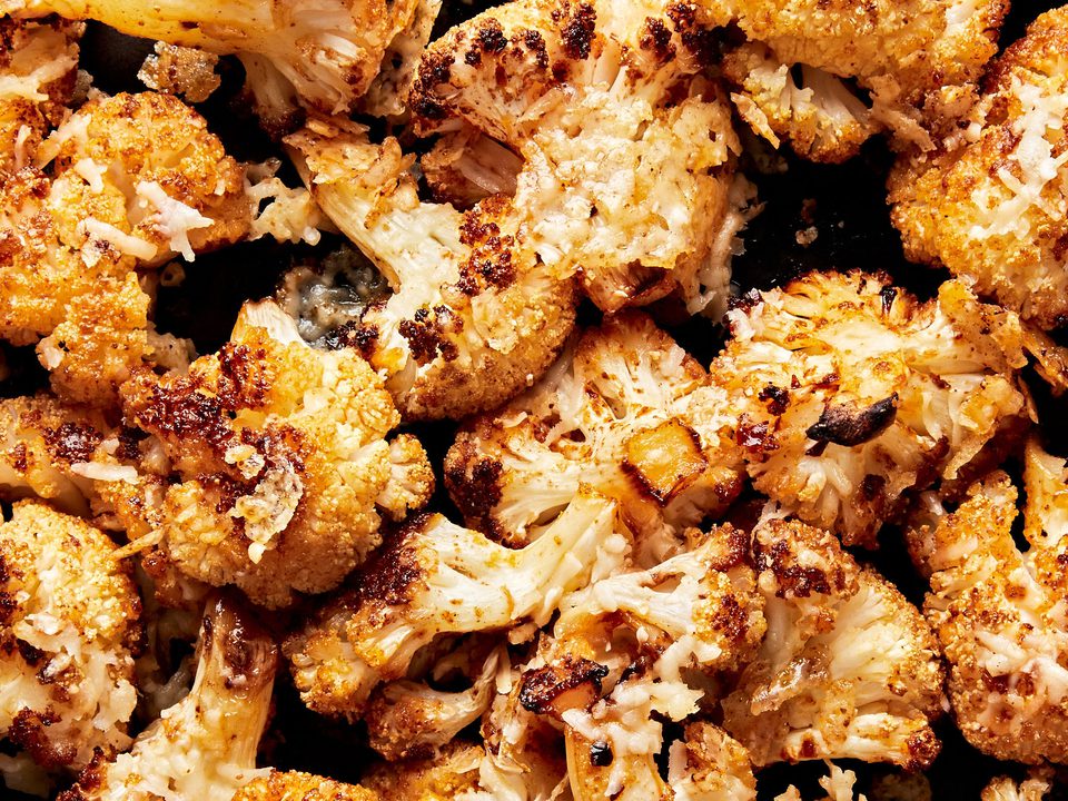 roasted cauliflower seasoned with olive oil, salt, garlic powder, smoked paprika, red pepper flakes, and grated Parmesan