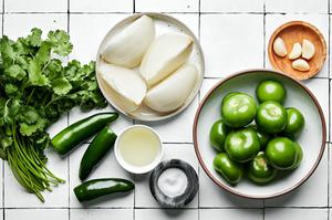 tomatillos, onion, jalapeños, cilantro and salt in prep bowls to make salsa verde
