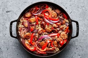 sausage and rice skillet made with italian chicken sausage, peppers, onions, spices, basil, rice and chicken stock
