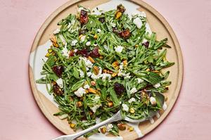 shaved snap pea salad with goat cheese, dates, pistachios and mint tossed with a goat cheese dressing