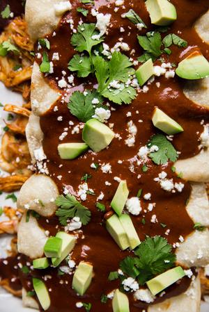 easy Chicken Mole Enchiladas with avocado quest fresco and avocado