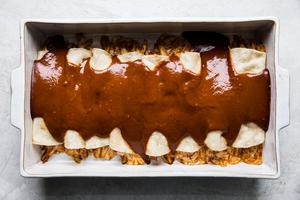 Simple Chicken Mole Enchiladas in baking dish