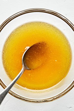 apple cider vinaigrette in a bowl made with apple cider vinegar, honey and olive oil