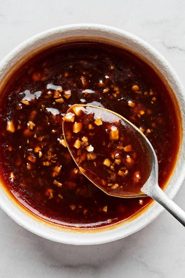 a dish of homemade stir fry sauce made with tamari, sesame oil, garlic, ginger, brown sugar, red pepper flakes and cornstarch