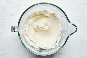 drained mascarpone and greek yogurt whipped together in a glass bowl