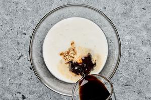 cornstarch slurry, brown sugar, soy sauce, honey, ginger, and garlic powder being combined in a bowl