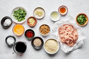 ground chicken, eggs, breadcrumbs, ginger, onions, garlic, sesame oil, tamari, brown sugar lime juice and cornstarch in bowls