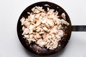 chicken browned in a pan