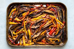 vegan Portobello Mushroom Fajitas with bell peppers on a sheet pan