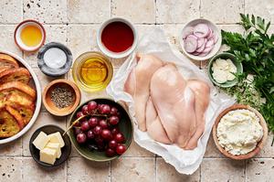 4 raw chicken breast, grapes, bread, ricotta, spices, parsley, thyme, olive oil, sherry vinegar and butter in prep bowls
