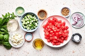 white balsamic vinegar, garlic, brown sugar, olive oil, salt, pepper, watermelon, cucumber, red onion, feta, mint & basil